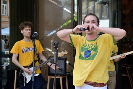 VILNIUS, LITHUANIA - MAY 18: Unidentified musician sing and play guitar in Street music day on May...