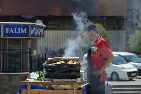 ISTANBUL - AUGUST 8  Unknown man trades food in a street near harbor, August 8, 2013 in Istanbul, Turkey  Istanbul is the world s fifth-most-popular tourist destination のeditorial素材