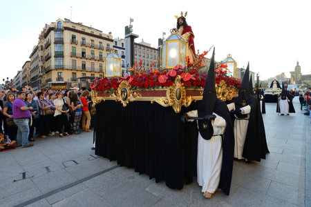 ZARAGOZA, SPAIN - APR 18, Unidentified people in the Good Friday procession, April 18, 2014 in the...