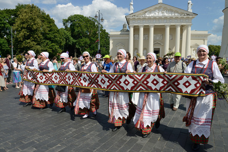 VILNIUS, LITHUANIA - JULY 6  Unidentified peoples parade in traditional Lithuanian Song Celebration on July 6, 2014 in Vilnius, Lithuaniaのeditorial素材