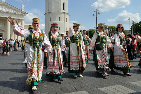 VILNIUS, LITHUANIA - JULY 6  Unidentified peoples parade in traditional Lithuanian Song Celebration on July 6, 2014 in Vilnius, Lithuaniaのeditorial素材