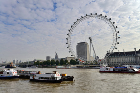 LONDON - OCTOBER 02: View of The London Eye on October 02, 2014 in London, UK. A famous tourist attraction over river Thames in the capital city London.のeditorial素材