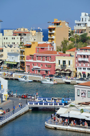 CRETE, AGIOS NIKOLAOS - AUGUST 09: town of Agios Nikolaos, Crete, Greece on 09 August 2014. Agios Nikolaos is one of the most popular tourism destinations in East Region of Crete island.のeditorial素材