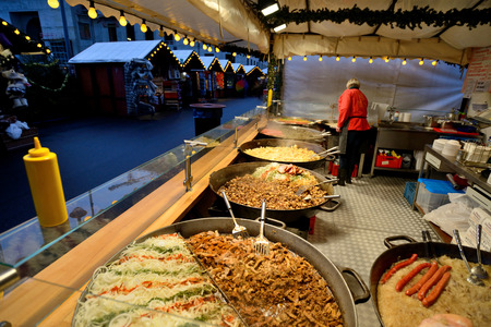 BERLIN - DECEMBER 25: Unidentified people trades food in annual traditional Christmas fair on 25 December 2014 in Berlin, Germany.のeditorial素材