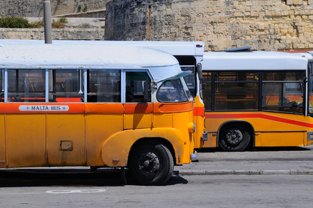 VALLETTA, MALTA - APR 17 :The legendary and iconic Malta public buses in the Valletta city bus station in Malta April 17, 2011のeditorial素材