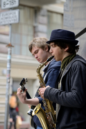 VILNIUS LITHUANIA  MAY 16: Unidentified musician plays Saxophone in Street Music Day on May 16 2015 in Vilnius. Its a most popular event on May in Vilnius Lithuaniaのeditorial素材