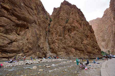 TODRA, MOROCCO - AUGUST 02: Unidentified people in a canyon in Morocco, August 02, 2015. Todra Gorge is a canyon in the High Atlas Mountains in Morocco, near the town of Tinerhir.のeditorial素材