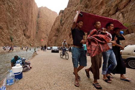 TODRA, MOROCCO - AUGUST 02: Unidentified people in a canyon in Morocco, August 02, 2015. Todra Gorge is a canyon in the High Atlas Mountains in Morocco, near the town of Tinerhir.のeditorial素材