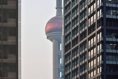 Pudong district skyscrapers in Shanghai, China. Pudong is a district of Shanghai, located east of...