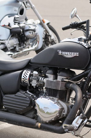 VILNIUS, LITHUANIA - MAY 1: Detail of Triumph motorbike in a parking on May 1, 2010 in Vilnius, Lithuania. Vilnius is largest city in Lithuania.のeditorial素材