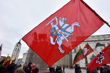 VILNIUS, LITHUANIA - MAR 11: Around one thousand people gathered with flags in a nationalist rally at Gedimino Avenue on Re-Establishment of Independence Day on March 11, 2017 in Vilnius, Lithuaniaのeditorial素材
