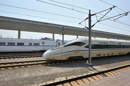 TONGXIANG, CHINA - MARCH 25, 2016: High Speed train on Tongxiang Railway Station on March 25, 2016...
