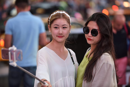 NEW YORK CITY - AUG. 26 : Unidentified people on the Times Square in Manhattan on August 26, 2017 in New York City, NY. Times Square is a major tourist destination and entertainment center.のeditorial素材