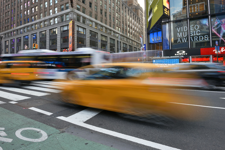 NEW YORK CITY, USA - AUG. 25 : Yellow taxis on street in Manhattan on August 25, 2017 in New York City, NY. Manhattan is the most densely populated borough of New York City.のeditorial素材