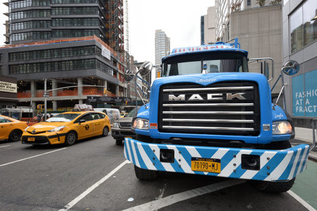 NEW YORK CITY, USA - AUG. 29 : Truck and cars on the street in Manhattan on August 29, 2017 in New York City, NY. Manhattan is the most densely populated borough of New York City.のeditorial素材