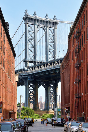 NEW YORK CITY - AUG. 27: Manhattan bridge view from Brooklyn Dumbo neighborhood on August 27, 2017 in New York City, NY. Manhattan Bridge connects boroughs of Manhattan and Brooklyn over East Riverのeditorial素材
