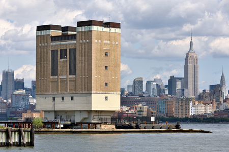 NEW YORK CITY, USA - AUG. 25: Manhattan Skyline and Holland Tunnel Ventilation Building on August 25, 2017 in New York City, NY. Manhattan is the most densely populated borough of NYC.のeditorial素材