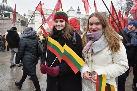 Vilnius, Lithuania - February 16: unidentified people gathered with flags in a natonal celebration for the Day of Independence of Lithuania on February 16th, 2018 in Vilnius, Lithuania.のeditorial素材