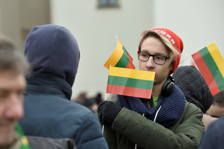 Vilnius, Lithuania - February 16: unidentified people gathered with flags in a natonal celebration for the Day of Independence of Lithuania on February 16th, 2019 in Vilnius, Lithuaniaのeditorial素材