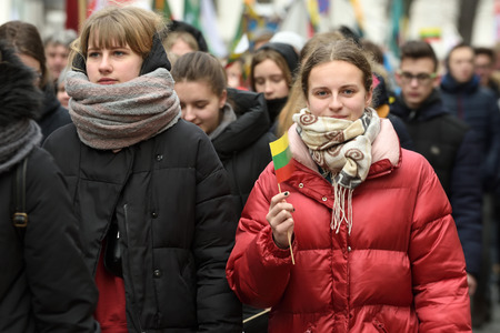Vilnius, Lithuania - February 16: unidentified people gathered with flags in a natonal celebration for the Day of Independence of Lithuania on February 16th, 2019 in Vilnius, Lithuaniaのeditorial素材
