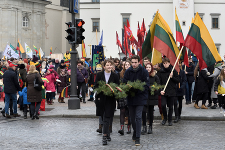 Vilnius, Lithuania - February 16: unidentified people gathered with flags in a natonal celebration for the Day of Independence of Lithuania on February 16th, 2019 in Vilnius, Lithuaniaのeditorial素材