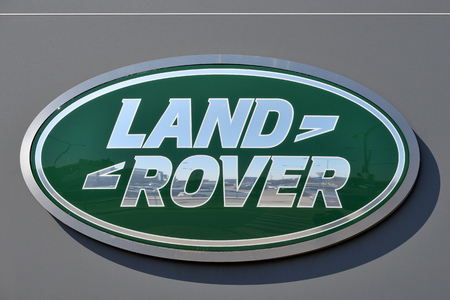 Vilnius, Lithuania - April 02: Land Rover car logotype on the wall in Vilnius on April 02, 2018. Land Rover - Brand British transnational carmaker Jaguar - Land Rover.のeditorial素材
