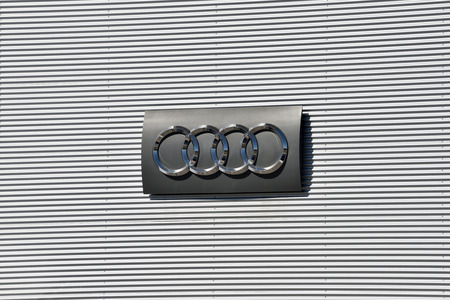 Vilnius, Lithuania - April 02: Audi logotype on the wall in Vilnius on April 02, 2018. Audi is a German automobile manufacturer.のeditorial素材