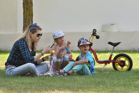 Vilnius, Lithuania - June 01: Unidentified people in public park in Vilnius Old Town on June 01, 2019 in Vilnius, Lithuania.のeditorial素材
