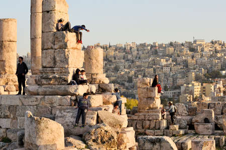 Amman, Jordan - February 15, 2020. Unidentified people at sunset in Amman Citadel, Jordan. The Amman Citadel is a historical site at the center of downtown Amman, the capital of Jordanのeditorial素材