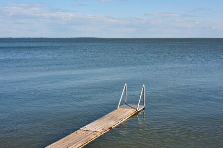 Small wooden pier at lake, West Lithuaniaの写真素材