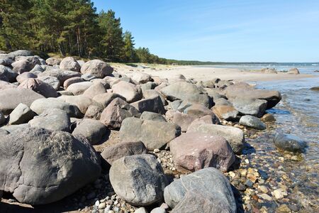 Large stones at Baltic sea shore, Latviaの写真素材