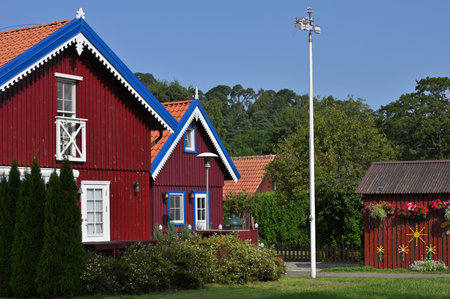 Juodkrante, Lithuania - August 23, 2022: Traditional architecture in Juodkrante, Lithuania. Juodkrante - is a seaside resort village located on the Curonian Spitのeditorial素材