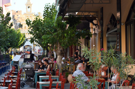 Palaiochora, August 6, 2022: Restaurant at city street on August 6, 2022 at Palaiochora, Greece. Palaiochora is a small town in Chania regional unit, Greeceのeditorial素材