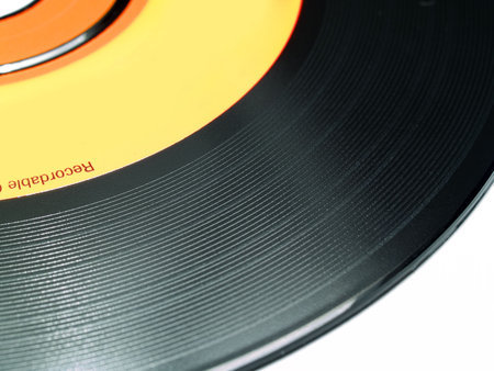 close-up of CDR disk. surface is like old fashion vinyl record.の写真素材