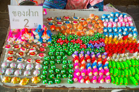 Different products made from collected sea shells, are sold on the shelves on the coast.の写真素材