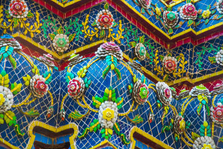 A beautiful Buddhist temple with gold in the capital of Thailandの写真素材