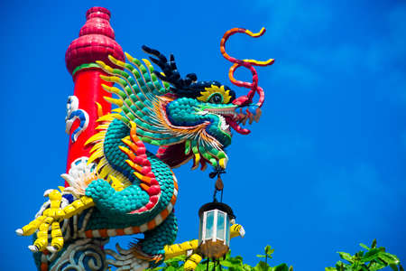 the colorful decoration of the temple with the image of animals and flowers.の写真素材