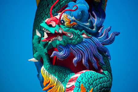 the colorful decoration of the temple with the image of animals and flowers.の写真素材