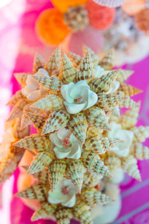 Lots of colorful, unusual and funny toys is on the tableの写真素材