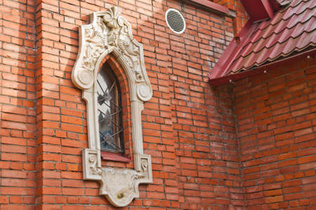 Old and beautiful castle, wooden door with lock, brick wallsの写真素材
