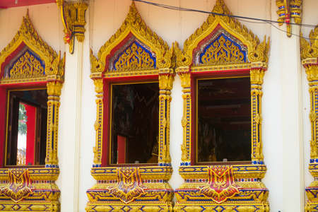 A fragment of decoration of the temple with a Golden imageの写真素材