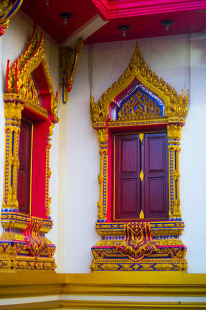 A fragment of decoration of the temple with a Golden imageの写真素材