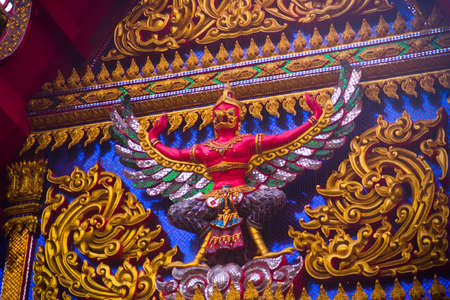 A fragment of decoration of the temple with a Golden imageの写真素材