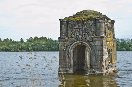 The flooded bell tower of the Church of the Vladimir icon of the Mother of God, 1795, on the river Vazuzaのeditorial素材
