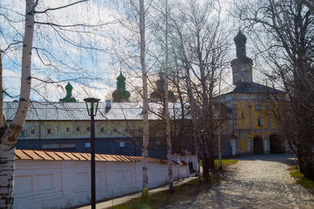 Old Orthodox religious buildings on the background of blue skyの写真素材