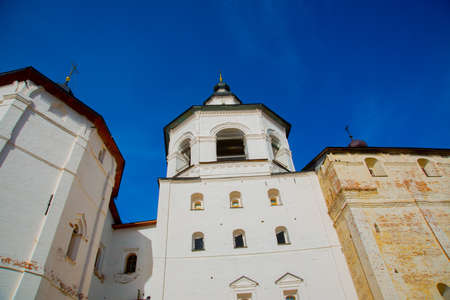 Old Orthodox religious buildings on the background of blue skyの写真素材