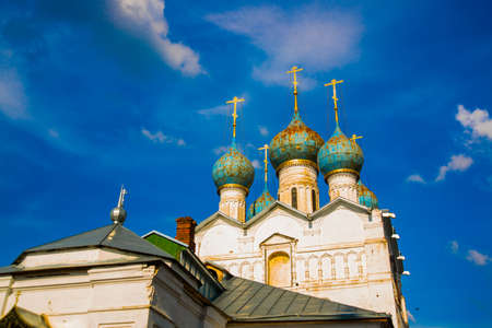Beautiful vintage Orthodox religious structures on the background of blue sky.Spring Sun.の写真素材