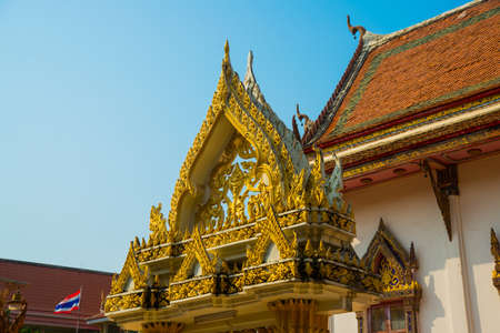 Ancient Buddhist temples with gold in a small town in Thailand.Khon Kaen