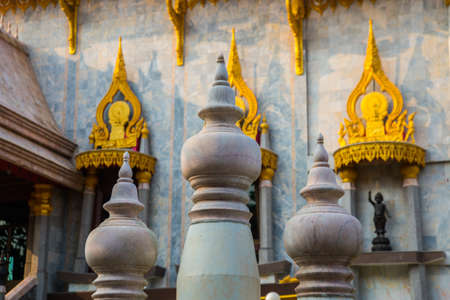 Ancient Buddhist temples with gold in a small town in Thailand. Nakhon Ratchasima.の写真素材