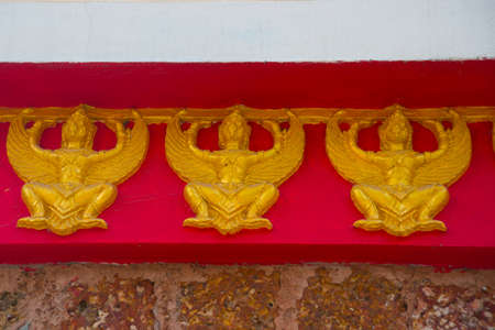 Ancient Buddhist temples with gold in a small town in Thailand. Nakhon Ratchasima.の写真素材